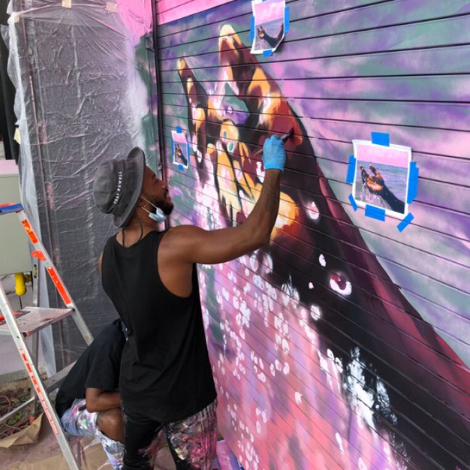 Local artist Mojo commissioned for murals that adorn new 545wyn building in Wynwood